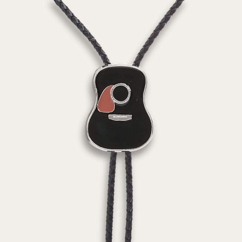 Black guitar slide held on the braided cord