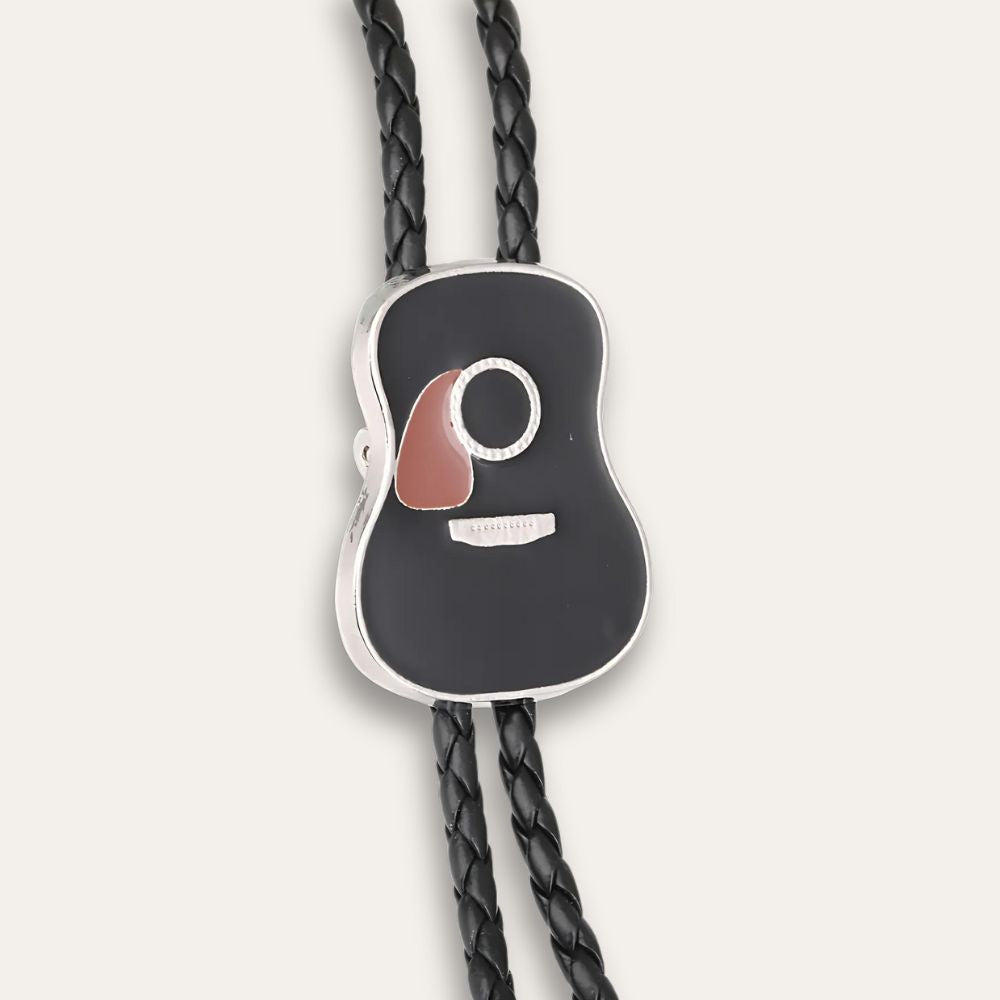 Close-up of the black guitar slide on the braided cord